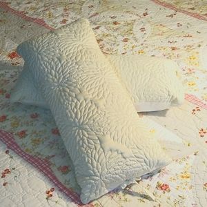 Two Quilted DKNY Bolster Pillows White